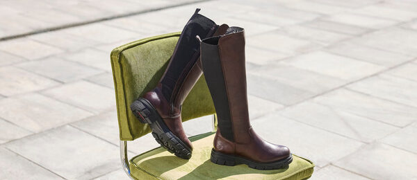 Kozačky vnesou do outfitu nadčasovost, která se jen tak neomrzí.